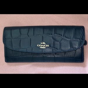 Blue leather Coach New York Wallet.